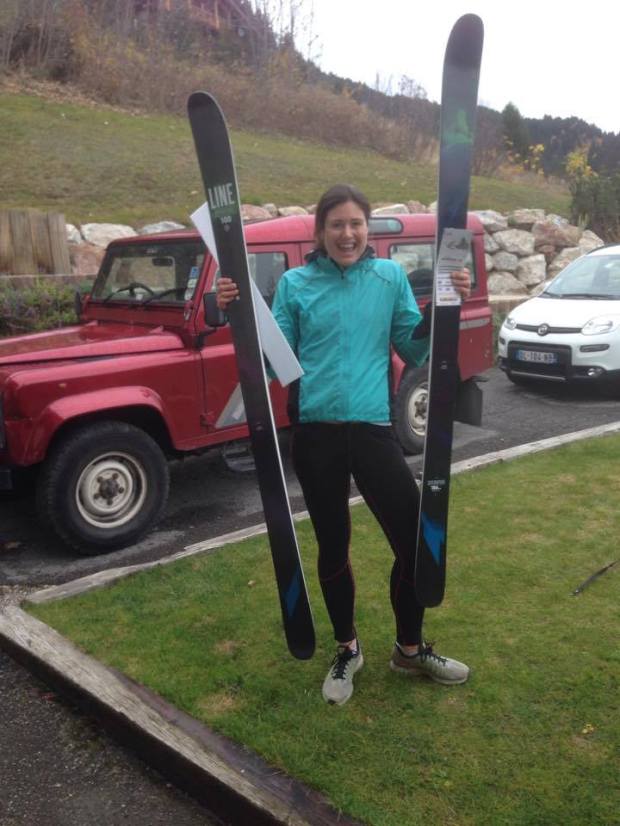 Big smile for big skis.